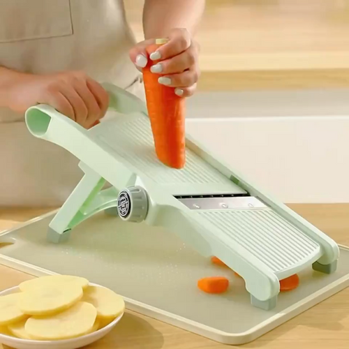 Adjustable vegetable slicer and grater kitchen tool